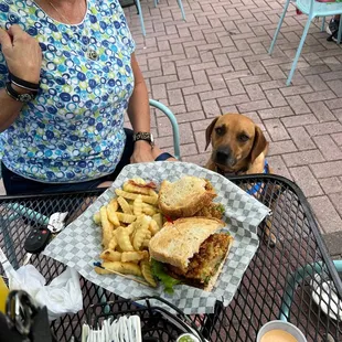 Mom and Enzo with a Fried Green Tomato BLT.