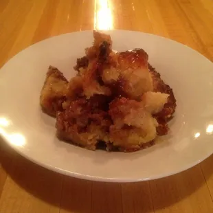 Stella&apos;s Signature Praline Bread Pudding topped with a Rougaroux Rum Sauce...  Sinfully delicious!