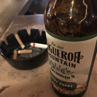 a bottle of beer on a counter