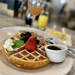Waffle, scrambled eggs, bottomless mimosa