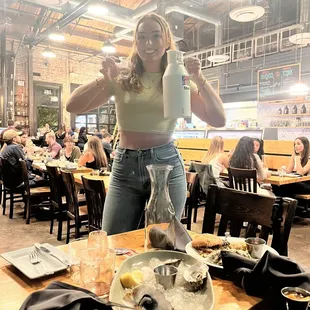 Happy law student with growler full of salted cucumber cider!