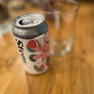 a can of cid on a table