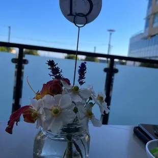 a vase of flowers on a table