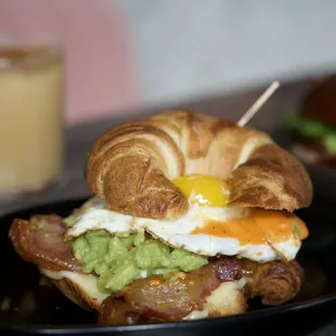 a croissant sandwich on a plate
