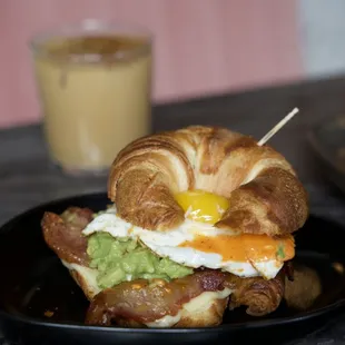 a croissant sandwich on a plate