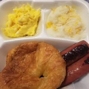 Eggs, grits, croissant and Chicken Sausage(yuminess) I favor the croissant over toast or biscuit~