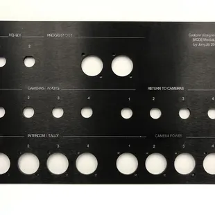 The panel they sand blasted and engraved. Letter spacing is not correct.