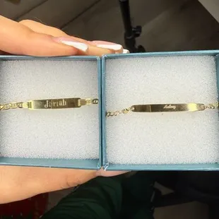 Font is not centered, and the font on the right side bracelet is way too small to read. What was she thinking??