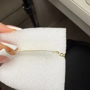 Fingerprints still on the jewelry, they are also scratched and bent.