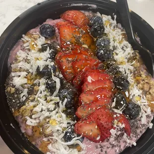 Strawberry açaí bowl with less granola requested