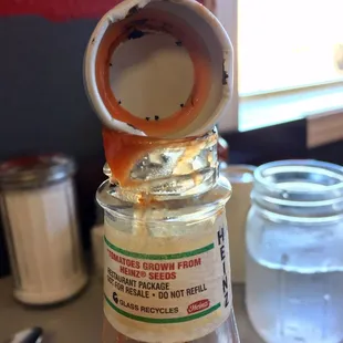 I'm all about re-using stuff, but I'm pretty sure these are going to give someone food-born botulism.