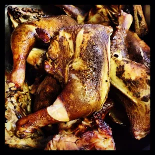 a close up of a roasting chicken