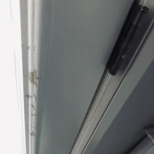 Peeling paint throughout