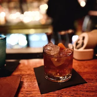 a glass of alcohol and a drink