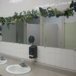 Totally unnecessary silk garlands decorating the ladies room mirrors...
