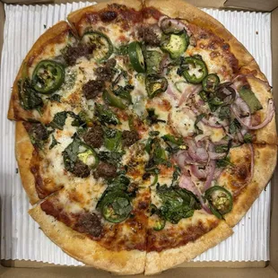 Small pizza. Thin crust. Half cheese with veggies, half ground beef with veggies. They remade this in a medium size and it was much better