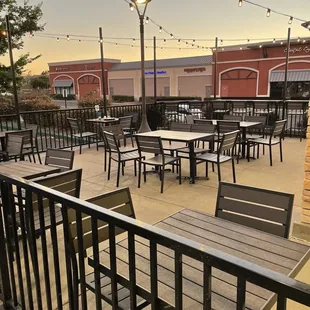 Outdoor patio. It's layed out nicely. No awning or umbrella could get hot.