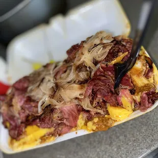 Pastrami Chili cheese fry with grilled onions