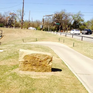 There's a lot of road noise here. Many holes are along really busy streets.