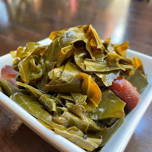 a plate of collard greens