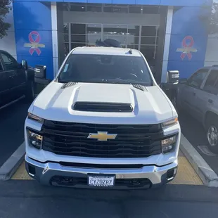 View of truck with Harley in bed