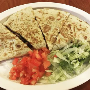 Chicken Quesadilla!  Comes with chicken, green peppers, onions and cheddar cheese inside the tortilla