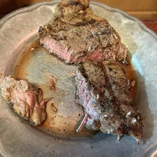 The medium well 9 oz filet. Thin and the texture nothing like most filets. Tough and somewhat chewy.