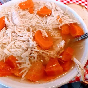 Bowl of chicken noodle soup comes with bagel crisp