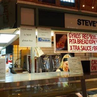 a woman behind the counter