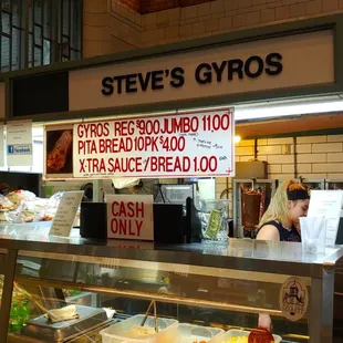 a woman behind the counter