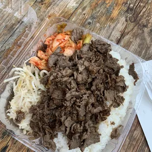 ows a meal in a plastic container