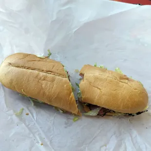 Pastrami sandwich with extra meat and no onion.