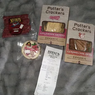 They have Potter's crackers. Nueske's bacon but I got sticks and an assortment of in-state cheeses. More than liquor.