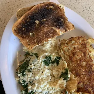 BURNT TO HECK TOAST !!! ?!? the cook didn't notice this mess he put on my plate !?! thats NOT edible !?!??