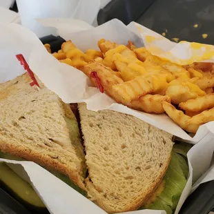 Overpriced chicken salad sandwich and cheese fries. Delicious but too expensive.