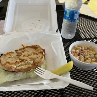 a sandwich and macaroni salad