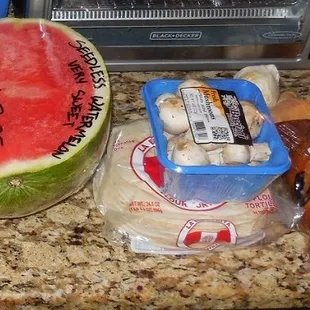 Watermelon, mushrooms, ginger, garlic, tortillas, and blueberry banana bread...