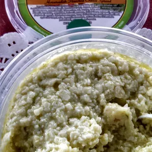 a container of fresh garden dip