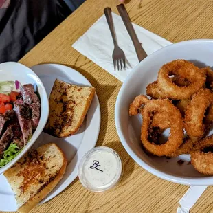 Steak salad and onion rings