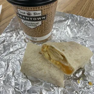 Coffee and breakfast burrito.