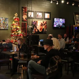 a group of people sitting at tables
