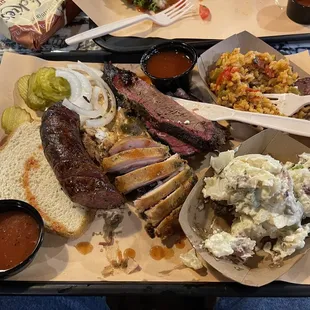 Brisket, sausage, chicken, potato salad, and jambalaya