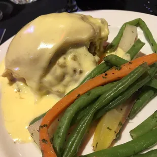 Wild rice stuffed chicken with vegetables.