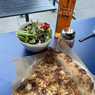 Sausage pizza and seasonal strawberry salad