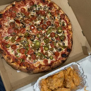 Combination pizza (+jalapeños), buffalo-garlic parm wings.
