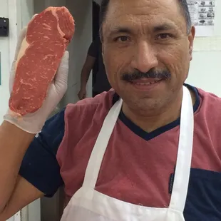 Meet Humberto and his beautifully trimmed NY Strip steak. Super friendly and helpful butcher.