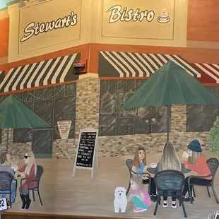 a painting of a restaurant with people and a dog