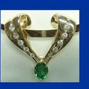 Emerald, Diamond and 14ky gold.