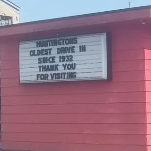 a sign on the side of a building