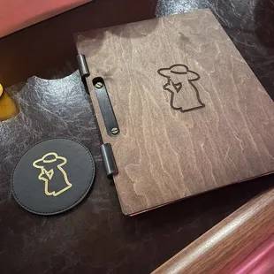 a notepad and pen on a desk